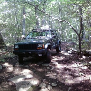 Little wheeling trip in July. Trail about five miles from my house. Rockin' the stock rubber.