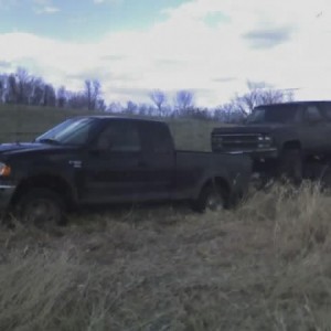 mostly stock pullin a trailer thru mud lol