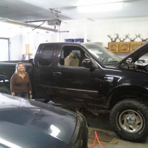 my neighbor next to my truck right after the body lift. only thing left was to put on the bumpers