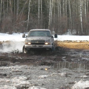 2006 chevy 15oohd. 6L, hypertech chip, 3 inch lift, 33 inch muds, 16x10 mags. it now has a chrome grill and a ARB winch bumper with a 9000lbs warn win