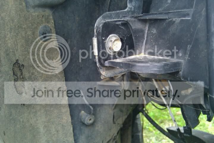 headlightmountbrok1.jpg